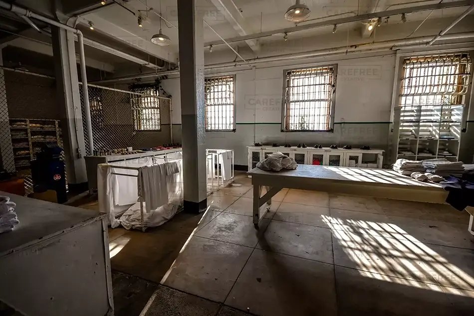 Sunlit Alcatraz Prison Interior with Linen Shelves, San Francisco, California · United States