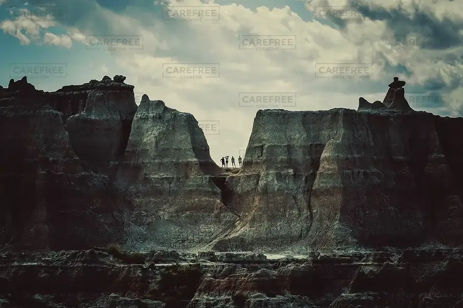 Badlands National Park Climber Silhouettes On A Cliff, South Dakota · United States
