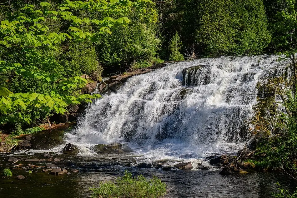 Bond Falls Cascading Waterfall Over Rocks, Trout Creek, Michigan · United States