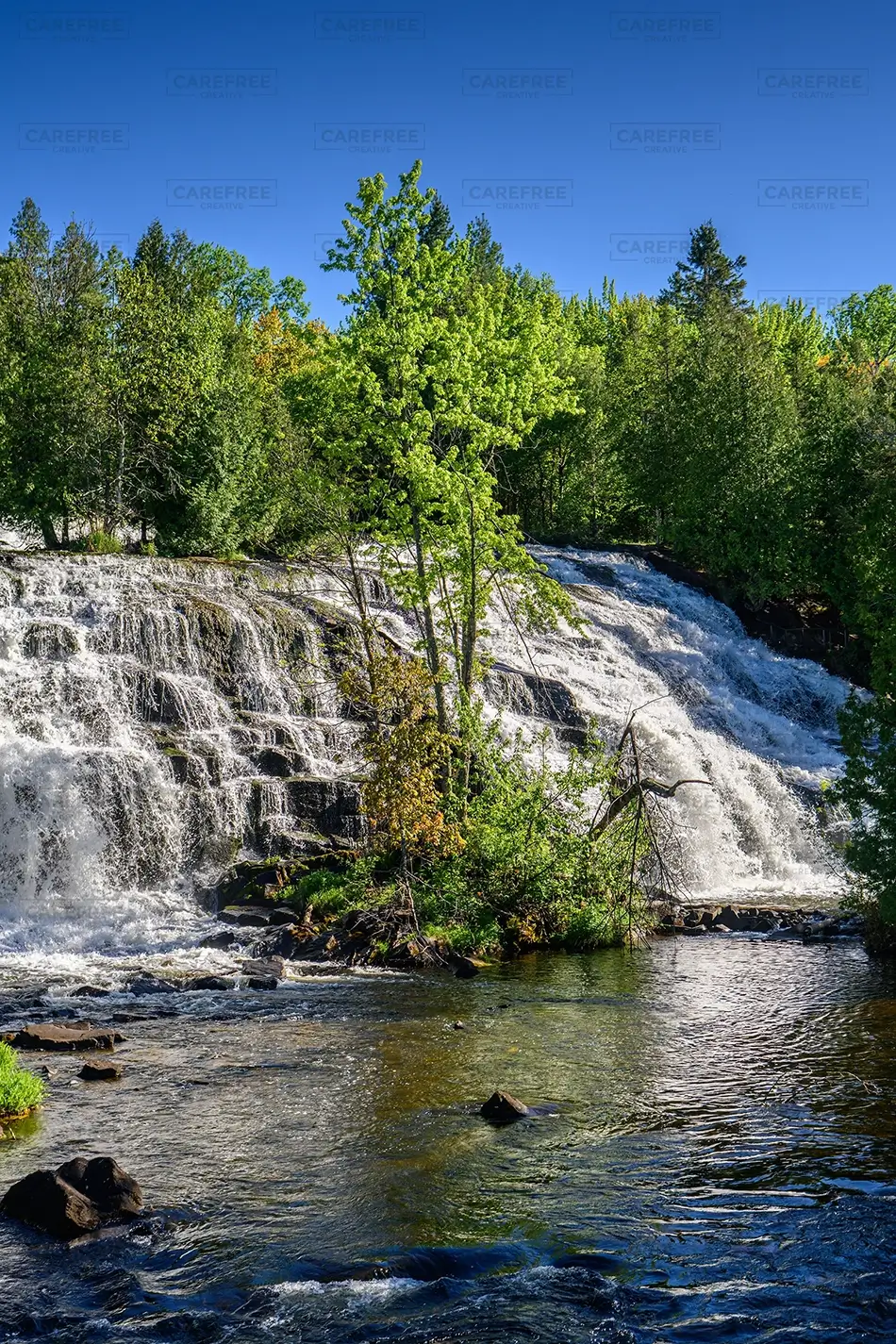 Bond Falls State Park Cascading Waterfall Over Rocks, Trout Creek, Michigan · United States