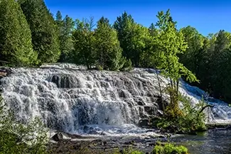 Bond Falls Sunlit Waterfall in the Forest, Trout Creek, Michigan
