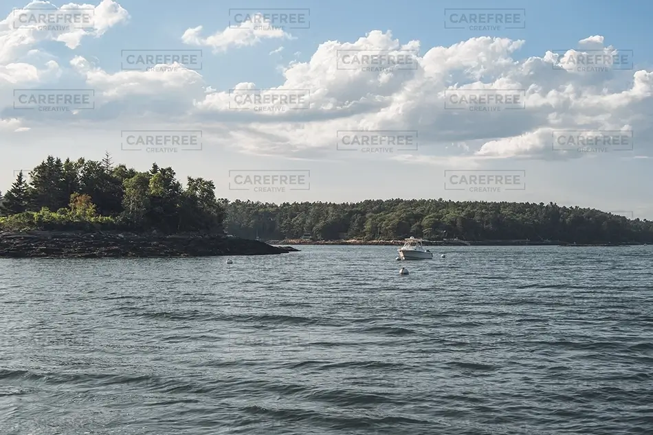 Cabbage Island Boat Near Forested Shore, Boothbay, Maine · United States