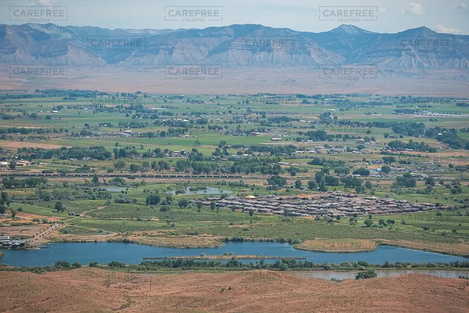 Colorado National Monument Desert Foreground Overlooking Lush Valley, Grand Junction, Colorado · United States