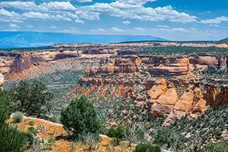 Scenic Red Rock Canyon Landscape Under Blue Sky, Grand Junction, Colorado
