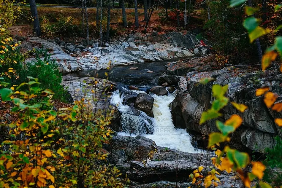Coos Canyon River Flow Through Fall Colors, Byron, Maine · United States