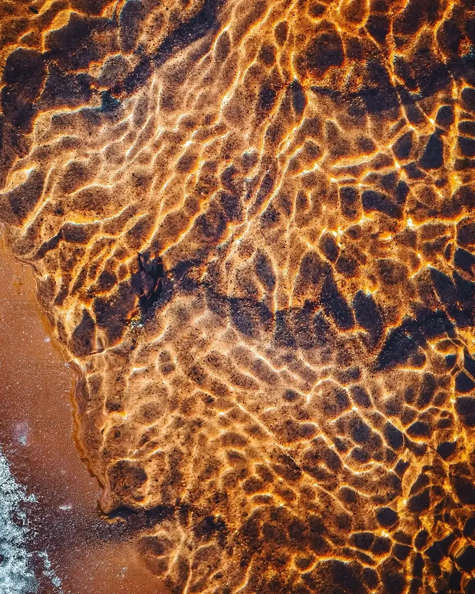 Crescent Beach State Park Sunlit Water Patterns on Sand, Cape Elizabeth, Maine · United States