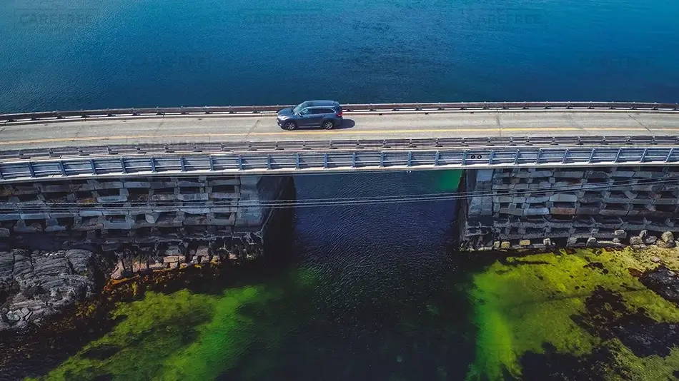 Cribstone Bridge with Passing Car, Harpswell, Maine · United States