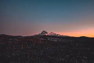 Dee Wright Observatory Silhouette Against Dusk Sky, Blue River, Oregon