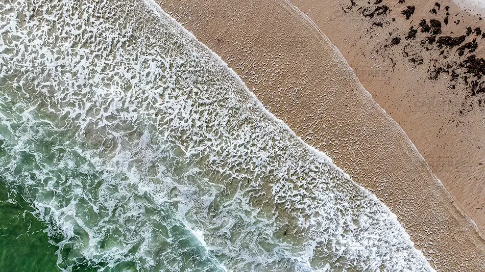 Fortunes Rock Beach Foamy Waves Crashing on Sand, Biddeford, Maine · United States
