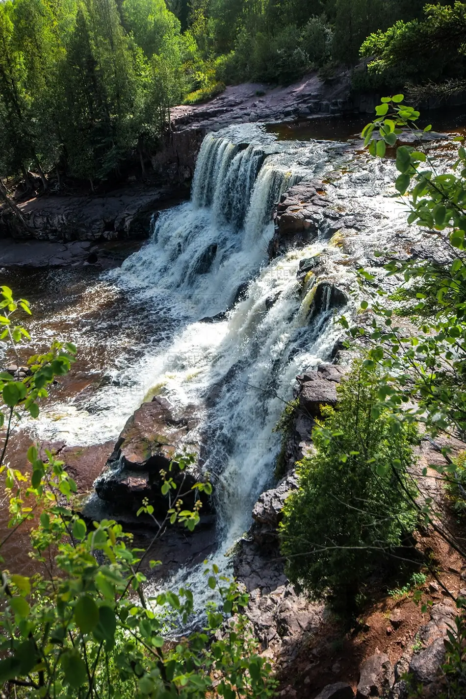 Gooseberry Falls State Park Waterfall Amidst Lush Greenery, Two Harbors, Minnesota · United States
