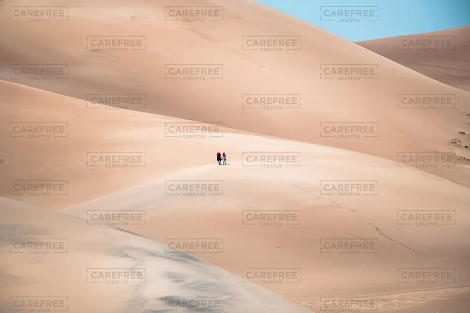 Great Sand Dunes National Park Serene Dune Landscape with Visitors, Alamosa, Colorado · United States