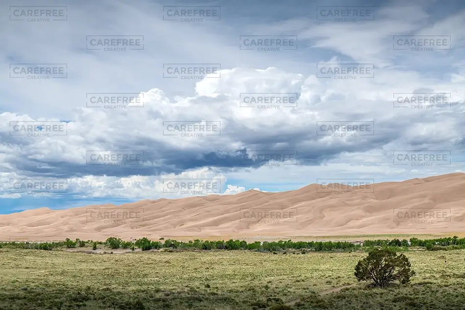 Great Sand Dunes National Park Serene Dune Landscape with Clouds, Alamosa, Colorado · United States