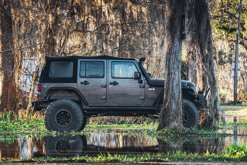 Honey Island Swamp Jeep Surrounded by Trees, Slidell, Louisiana · United States