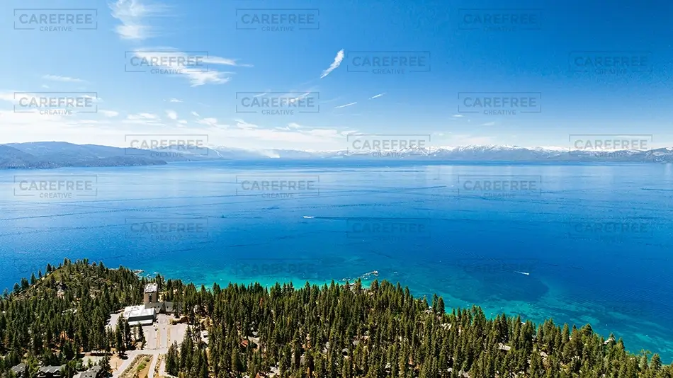 Lake Tahoe Aerial View of Blue Waters and Pines, South Lake Tahoe, California · United States