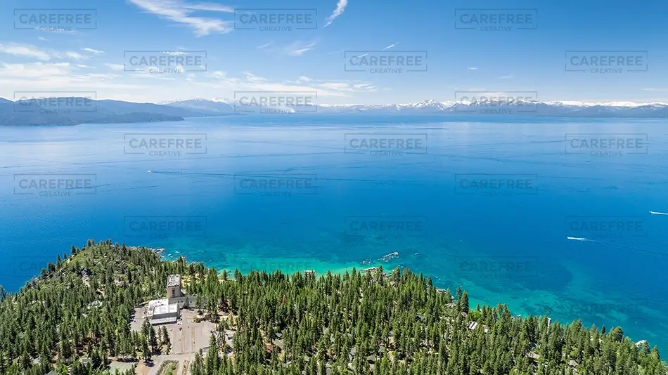 Lake Tahoe Forested Point and Blue Water, South Lake Tahoe, California · United States