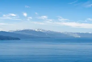 Lake Tahoe Serene Mountain Reflections and Blue Sky, South Lake Tahoe, California