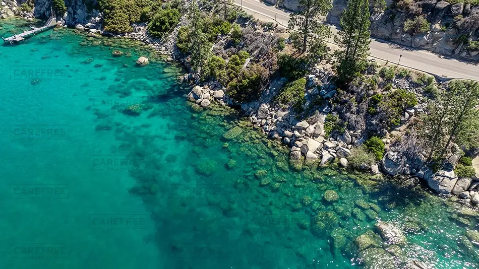 Lake Tahoe Clear Blue Water and Rocky Shoreline, South Lake Tahoe, California · United States