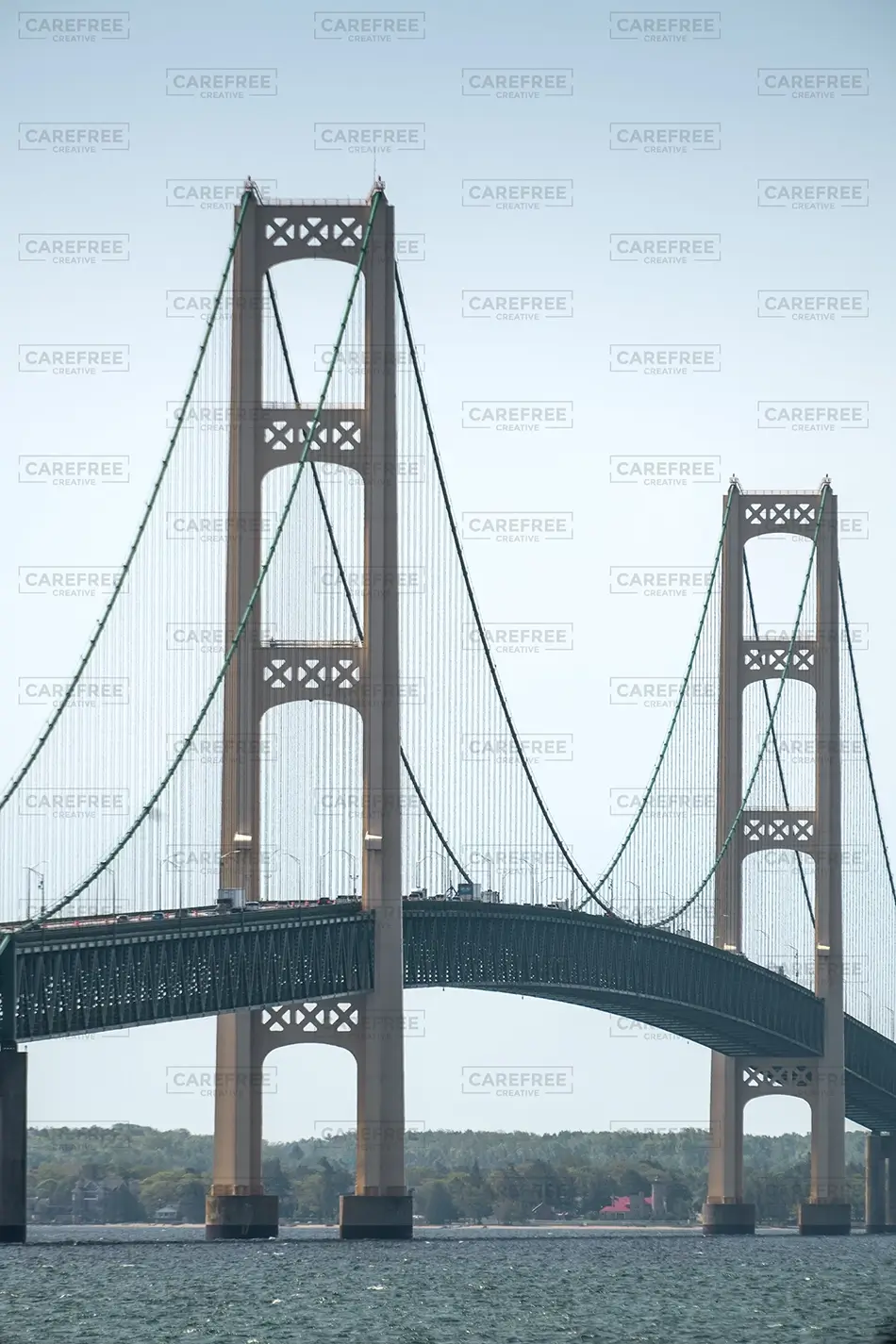 Mackinac Bridge Suspension Towers Over Water, Mackinaw City, Michigan · United States