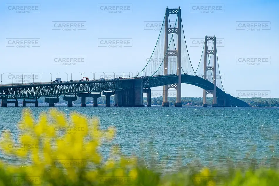 Mackinac Bridge Suspension Towers Over Water, Mackinaw City, Michigan · United States