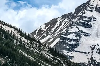 Maroon Bells Snowy Mountains and Pine Forest, Aspen, Colorado