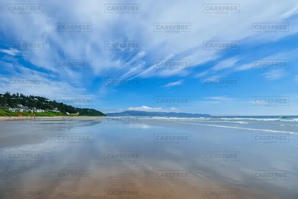 Oceanside Beach Expansive Sky and Reflective Shores, Oceanside, Oregon · United States
