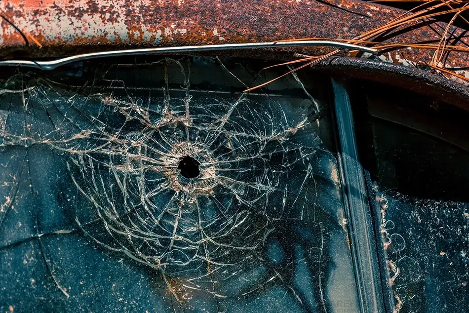 Old Car City USA Bullet hole Cracked Glass, White, Georgia · United States