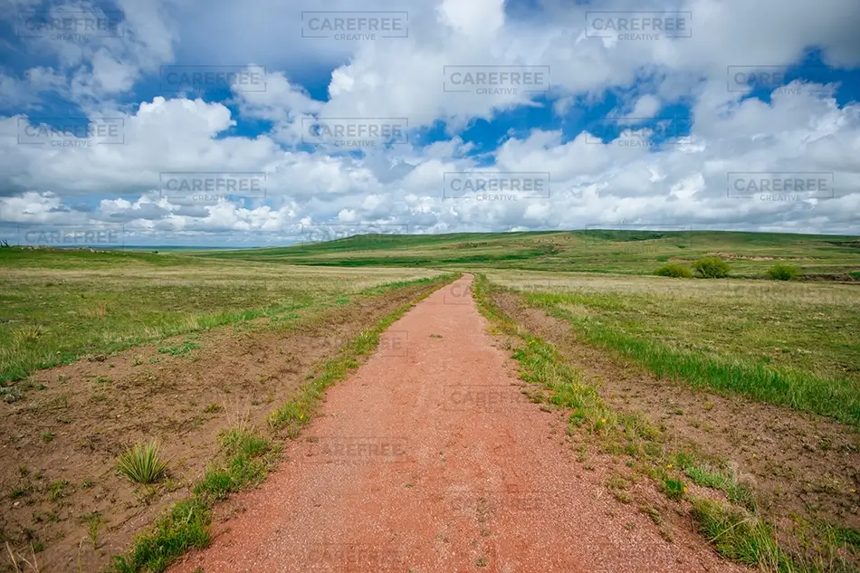Paint Mines Interpretive Park Scenic Pathway Under Clouds, Calhan, Colorado · United States