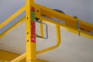 Painting Yellow Safety Guardrail Frame