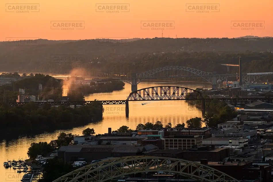 Point Of View Cityscape Orange Sunset Over Bridges