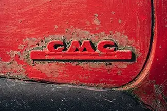 Rocky Ridge Orchard Vintage Red GMC Emblem, Bowdoin, Maine