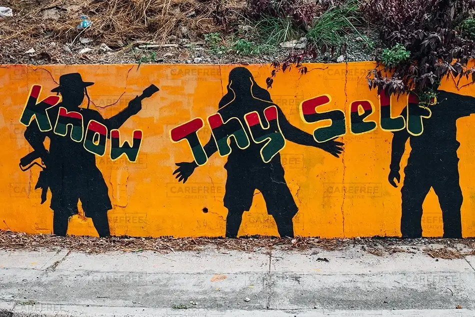 St Thomas Inspirational Street Art on Orange Wall, USVI · Caribbean