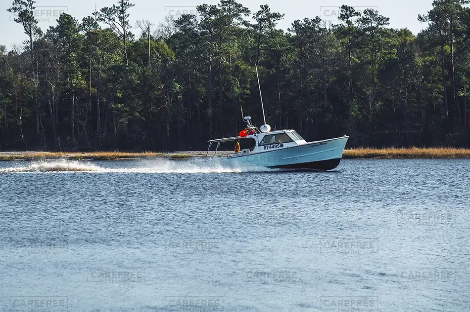 Vereen Memorial Gardens Boat Speeding Across Water, Little River, South Carolina · United States