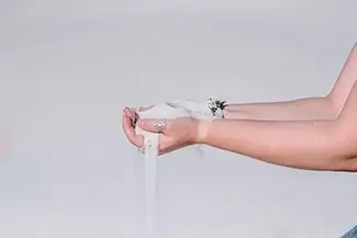 White Sands National Park Sand Trickling from Hand, New Mexico