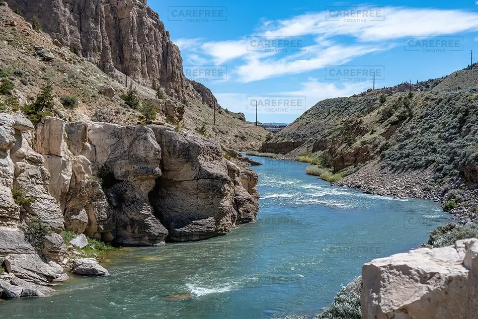 Wyoming River Flowing Through Rocky Canyon, Wyoming · United States