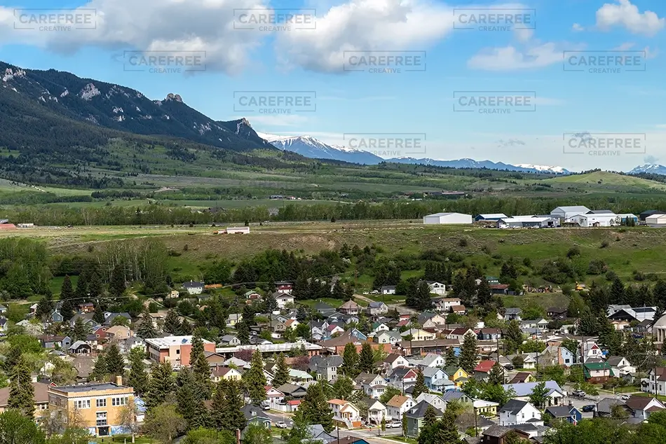 Wyoming Scenic View of Green Hills and Town, Wyoming · United States
