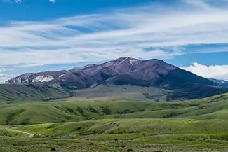Wyoming Mountains With A Verdant Landscape, Wyoming