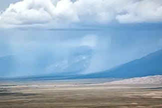 Zapata Falls Mountain Landscape with Dramatic Clouds, Alamosa, Colorado