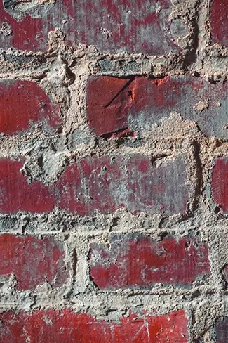 Atalaya Castle Weathered Red Brick Wall