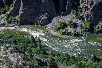 Black Canyon Of The Gunnison River Carving Through Deep Canyon