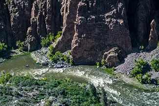 Black Canyon Of The Gunnison Steep Canyon Walls Towering Above