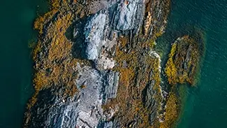 Cabbage Island Aerial Rocky Coastal Terrain