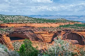 Scenic Red Rock Canyon Landscape with Distant Mountains