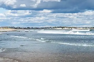 Fortunes Rock Beach Scenic Waves and Cloudy Sky